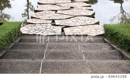 stone bridge in beautiful garden stone bridge in beautiful garden 69643399