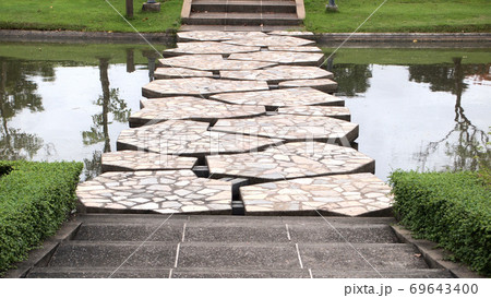 stone bridge in beautiful garden stone bridge in beautiful garden 69643400