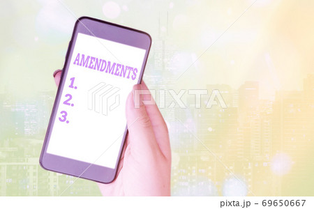 Writing note showing Amendments. Business photo 69650667