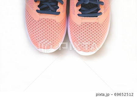 pink sneakers on white background. Generation z concept. pink sneakers on white background. Generation z concept. 69652512