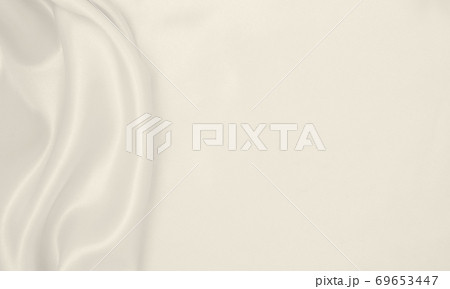 Smooth elegant golden silk or satin luxury cloth texture as wedding background. Luxurious background design. In Sepia toned. Retro style 69653447