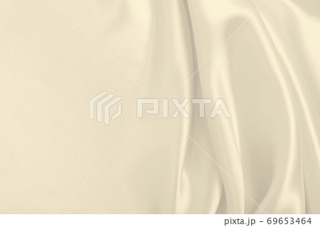 Smooth elegant golden silk or satin luxury cloth texture as wedding background. Luxurious background design. In Sepia toned. Retro style Smooth elegant golden silk or satin luxury cloth texture as wedding background. Luxurious background design. In Sepia toned. Retro style 69653464