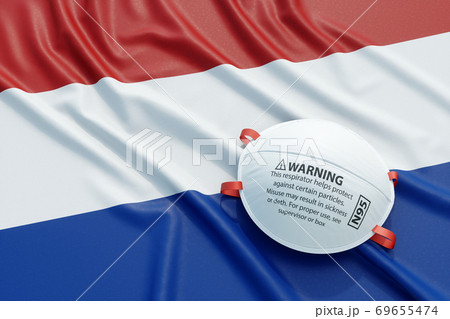 Coronavirus medical surgical face mask on the Dutch national flag 69655474