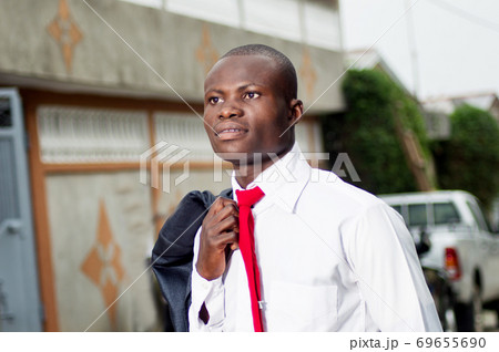 Portrait of young African businessman. 69655690