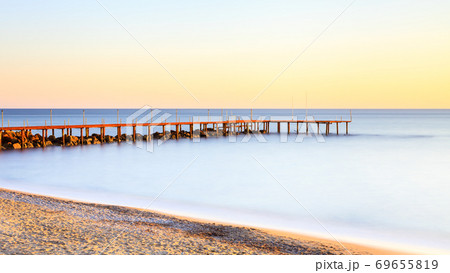 Mediterranean Dusk.  A long exposure of dusk over the Mediterranean Sea viewed from the southern Turkish coastline near Turkler. 69655819