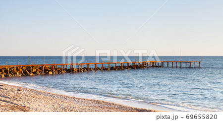 A landing stage to the Mediterranean Sea viewed from the southern Turkish coastline near Turkler. 69655820