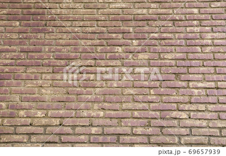 Grunge color brick wall surface background with selective focus 69657939