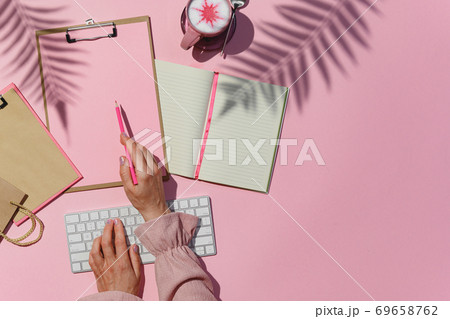 Online woman seller workspace flat lay top view Online woman seller workspace flat lay top view 69658762