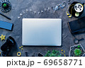 Workplace with gadgets, coffee cup and glasses 69658771