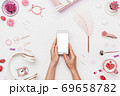 Female workspace for mobile web design creation 69658782