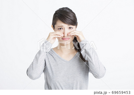 悲しい顔の女性の写真素材
