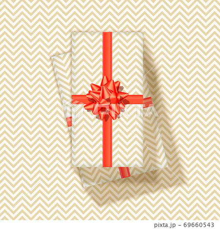 Stack of gift boxes with red ribbon and bow tie 69660543