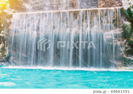 landscape of beautiful Artificial waterfall in garden at the public park 69661591