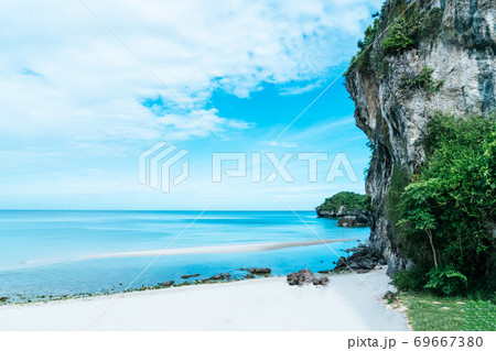Tropical nature clean beach and white sand in summer with rock mountain blue sky. 69667380