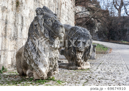 Sculpture of marble lions, a symbol of the city of Brescia, are installed in the park 69674910