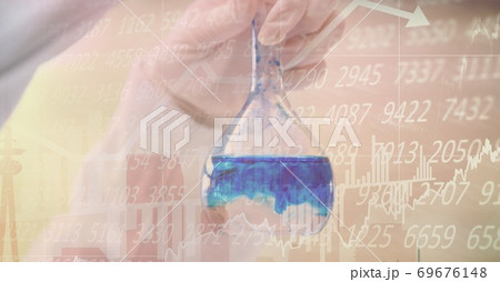 Digital illustration of a person holding a test tube filled with liquid over data processing 69676148