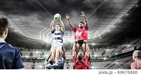 Digital composite image of team of rugby players jumping to catch the ball in a line out in sports s Digital composite image of team of rugby players jumping to catch the ball in a line out in sports s 69676880