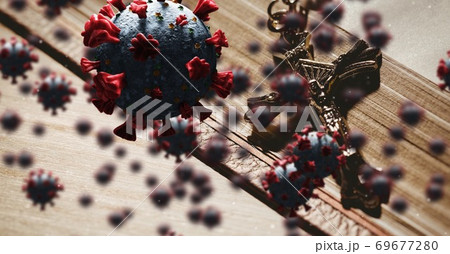 Covid-19 cells against cross on bible 69677280