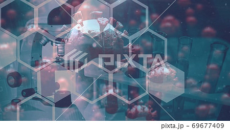 Covid-19 cells against test tubes in background 69677409