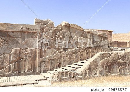 Famous bas-relief on the wall in ancient city Persepolis,  Iran 69678377