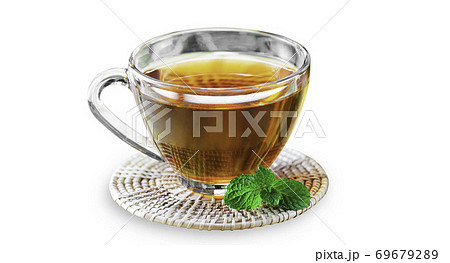 Organic black tea in glass cup on wooden coaster on white isolated background with clipping path. Hot chinese black tea served with mint leaves have good smell. Drinking and beverage concept. 69679289