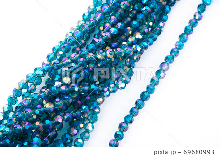 Beautiful emerald Glass Sparkle Crystal Isoalted Beads on white background. Beautiful emerald Glass Sparkle Crystal Isoalted Beads on white background. 69680993