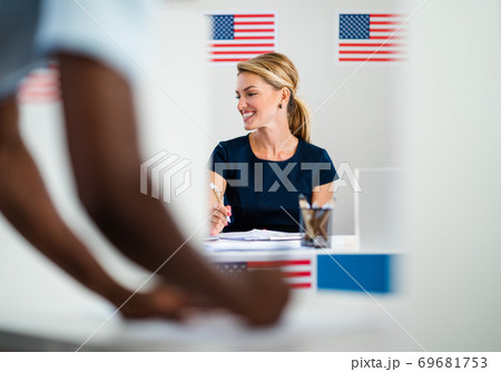Member of electoral commission in polling place, usa elections. Member of electoral commission in polling place, usa elections. 69681753