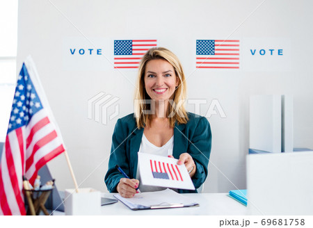 Member of electoral commission in polling place, usa elections. Member of electoral commission in polling place, usa elections. 69681758