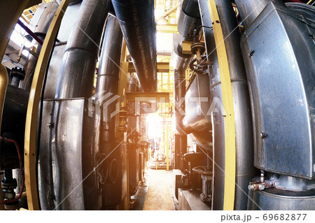 Industry plant concept,Equipment, cables and piping as found inside of a modern industrial power plant or offshore platform Industry plant concept,Equipment, cables and piping as found inside of a modern industrial power plant or offshore platform 69682877