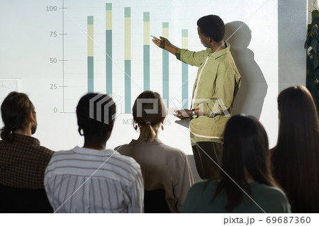 African Man Presenting at Business Conference African Man Presenting at Business Conference 69687360