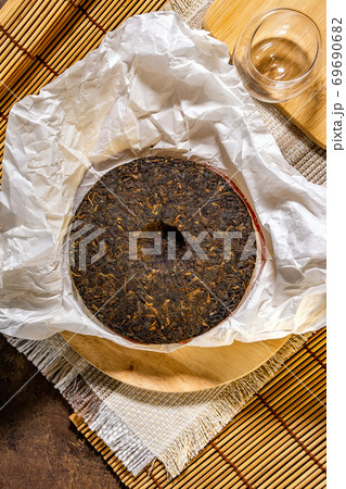 Chinese puer fermented and pressed tea. Healthy nutrition and antioxidant drinks. 69690682