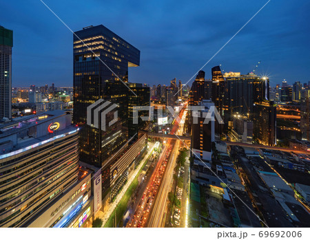 Aerial view of Rama 9 road, New CBD, Bangkok Downtown, Thailand. Financial district and business centers in smart urban city in Asia. Skyscraper and high-rise buildings at night. Aerial view of Rama 9 road, New CBD, Bangkok Downtown, Thailand. Financial district and business centers in smart urban city in Asia. Skyscraper and high-rise buildings at night. 69692006