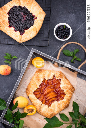 Sweet homemade galette pie with fruits Sweet homemade galette pie with fruits 69692538
