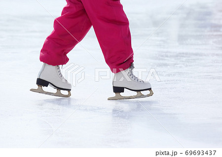feet skating on the ice rink feet skating on the ice rink 69693437