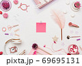 Woman workspace flat lay with paper sheet sticker 69695131