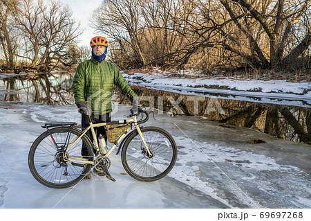 winter biking or commuting concept winter biking or commuting concept 69697268