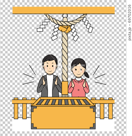 Two people worshiping at a shrine 69702016