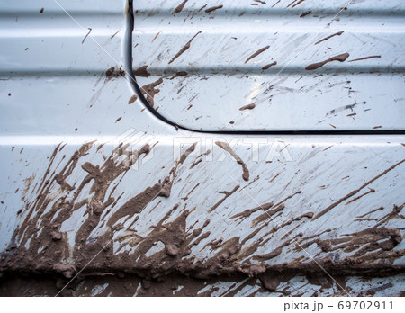 Mud stain on the side of car Mud stain on the side of car 69702911