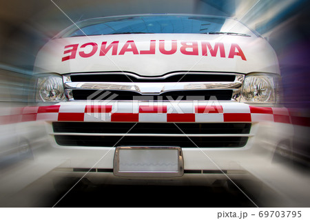Ambulance car, front view. Emergency rescue service van with motion blurred background 69703795
