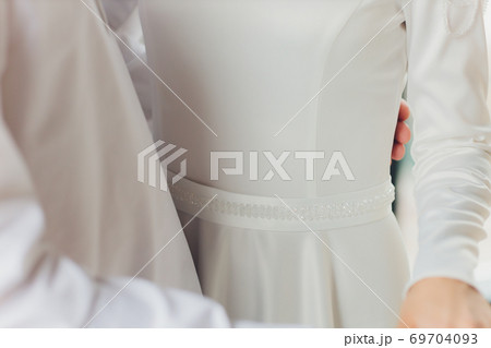 National wedding. Bride and groom. Wedding muslim couple during the marriage ceremony. Muslim marriage. National wedding. Bride and groom. Wedding muslim couple during the marriage ceremony. Muslim marriage. 69704093