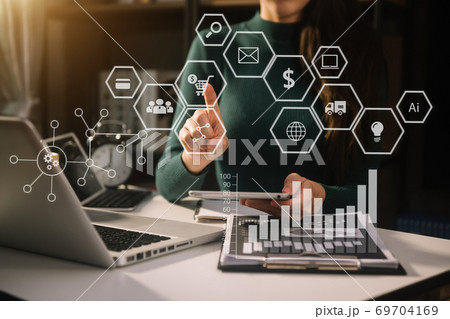Coding software developer work with augmented reality dashboard computer icons with responsive cybersecurity. Coding software developer work with augmented reality dashboard computer icons with responsive cybersecurity. 69704169