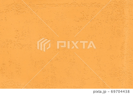 Saturated orange low contrast Concrete textured background  69704438