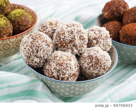 Energy protein balls with coconut flakes Energy protein balls with coconut flakes 69706933