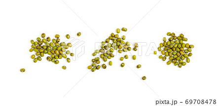 Dry raw mung beans or vigna radiata seeds isolated on white Dry raw mung beans or vigna radiata seeds isolated on white 69708478