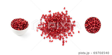 Pile of Pomegranate Seeds in Bowl Isolated on White Background 69708540