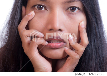 Portrait of a stressed young women Portrait of a stressed young women 69712526