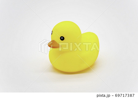 Yellow little duck doll, yellow rubber duck doll, duck bath toy for children, baby toy on white background. 69717387