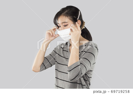 young asian woman feel have fever and sick young asian woman feel have fever and sick 69719258