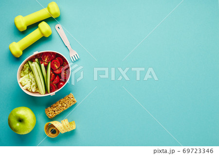 Creative flat lay of sport and fitness equipments. 69723346