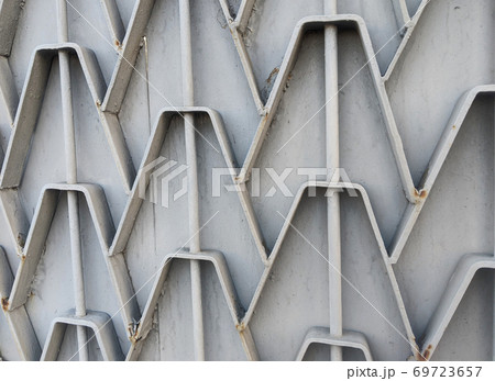 Grey metal gate pattern detail Grey metal gate pattern detail 69723657